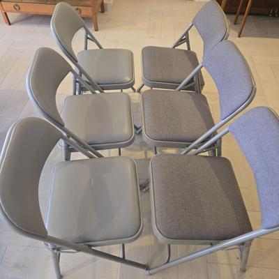 LOT 444B: Six Grey Folding Chairs /3 with Fabric Seats and 3 with Leather-Like Seats