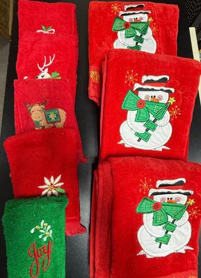 Sale Photo Thumbnail #127: Red and green, with embroidery of snowmen, reindeer, snowflakes, and more.  Great condition.