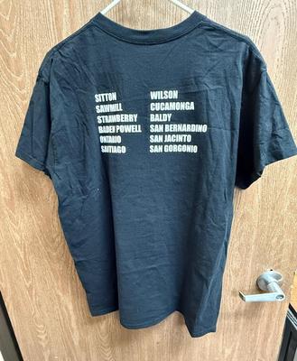 Sale Photo Thumbnail #106: Front image of a woman at a summit holding an "I DID IT" sign, back is a list of the 12 Southern California peaks climbed.  Good used condition. Made by Gildan, ultra cotton.