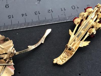 Rose Brooch/pins. Marked