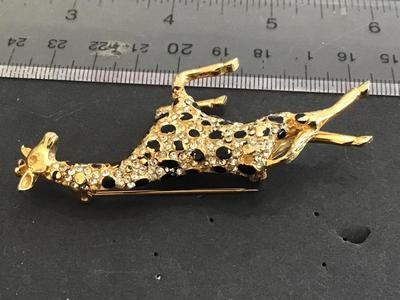 Hattie Carnegie Jumping Giraffe Brooch. Signed