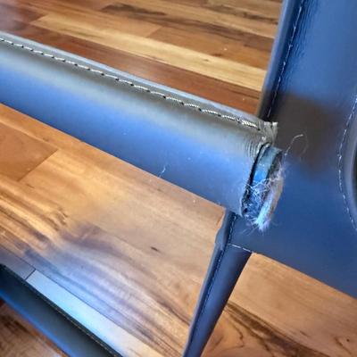 Six Mink Hued Leather Side Chairs