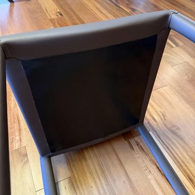 Six Mink Hued Leather Side Chairs