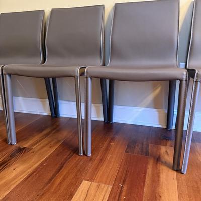 Six Mink Hued Leather Side Chairs