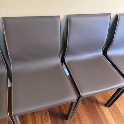 Six Mink Hued Leather Side Chairs
