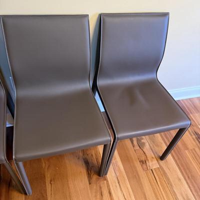 Six Mink Hued Leather Side Chairs