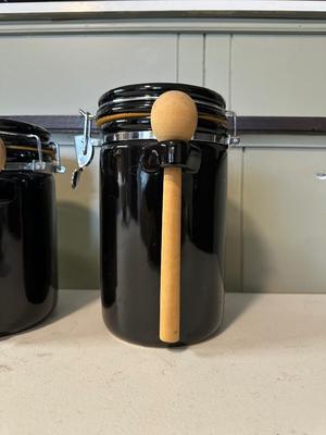 4 PIECE BLACK CERAMIC CANISTERS