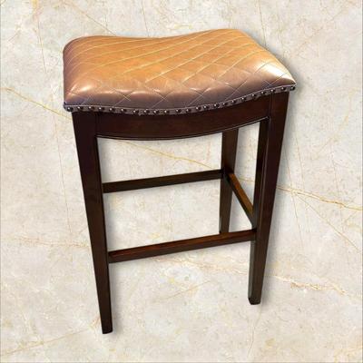 Sale Photo Thumbnail #105: Pair of Solid Wood, Brown Quilted Saddle Bar Stools with Nail Head Trim
Made in Vietnam.
Height: 30"
Seat 19" x 13"