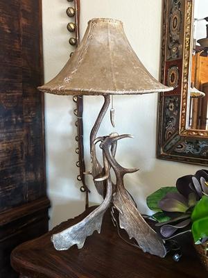 Sale Photo Thumbnail #96: Rustic Free Standing Moose Antler Table Lamp With A Rawhide Translucent Shade
34" Tall, 18" Widest Part of Base