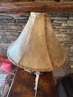 Sale Photo Thumbnail #100: Rustic Free Standing Moose Antler Table Lamp With A Rawhide Translucent Shade
34" Tall, 18" Widest Part of Base