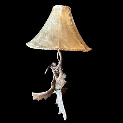 Sale Photo Thumbnail #97: Rustic Free Standing Moose Antler Table Lamp With A Rawhide Translucent Shade
34" Tall, 18" Widest Part of Base