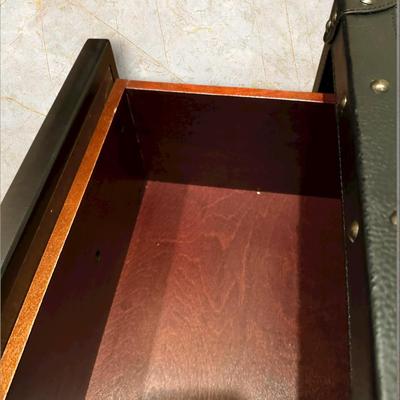 Sale Photo Thumbnail #123: Trunk Style Three Drawer Accent Chest.  This Chest provides storage with a vintage look featuring faux leather accents, metal hardware and decorative studs to resemble an old travel trunk. By Sunforce Furniture. 
M'ments:
Height 32"
Width 38"
Depth 18"