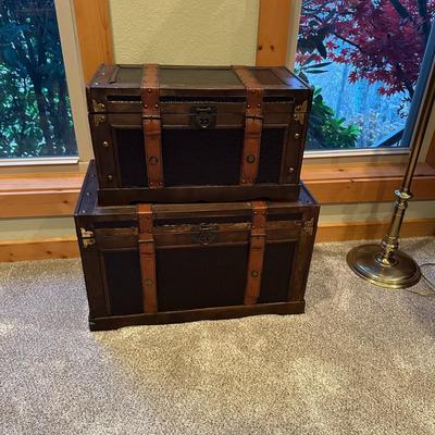 Sale Photo Thumbnail #132: Two Vintage Style Decorative Storage Trunks
M'ments Large:
25" x 14" x 15.5"
Small:
20" x 10.5" x 12"
