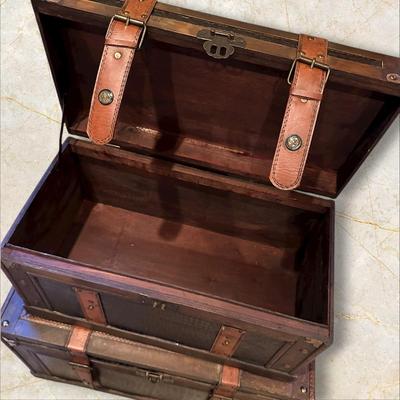 Sale Photo Thumbnail #136: Two Vintage Style Decorative Storage Trunks
M'ments Large:
25" x 14" x 15.5"
Small:
20" x 10.5" x 12"