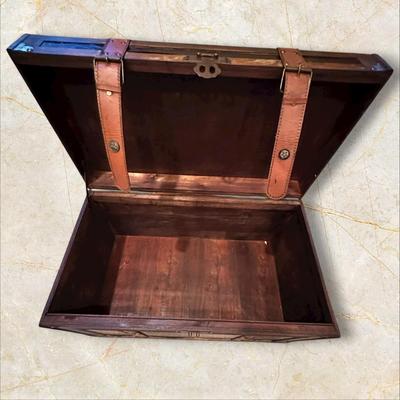 Sale Photo Thumbnail #138: Two Vintage Style Decorative Storage Trunks
M'ments Large:
25" x 14" x 15.5"
Small:
20" x 10.5" x 12"
