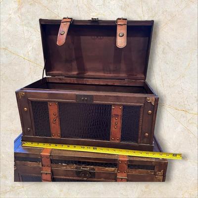 Sale Photo Thumbnail #133: Two Vintage Style Decorative Storage Trunks
M'ments Large:
25" x 14" x 15.5"
Small:
20" x 10.5" x 12"
