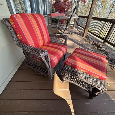 Sale Photo Thumbnail #163: Wicker Porch Swivel Glider Chair with Ottoman and Orange Cushions #1
Have been on covered porch outdoors-wear on wicker as shown in photos