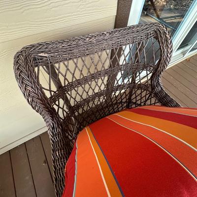 Sale Photo Thumbnail #174: Wicker Porch Swivel Glider Chair with Ottoman and Orange Cushions #1
Have been on covered porch outdoors-wear on wicker as shown in photos