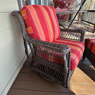 Sale Photo Thumbnail #171: Wicker Porch Swivel Glider Chair with Ottoman and Orange Cushions #1
Have been on covered porch outdoors-wear on wicker as shown in photos