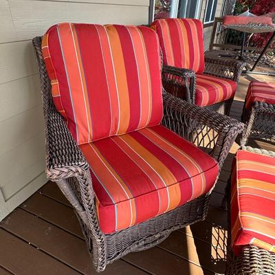 Sale Photo Thumbnail #168: Wicker Porch Swivel Glider Chair with Ottoman and Orange Cushions #1
Have been on covered porch outdoors-wear on wicker as shown in photos