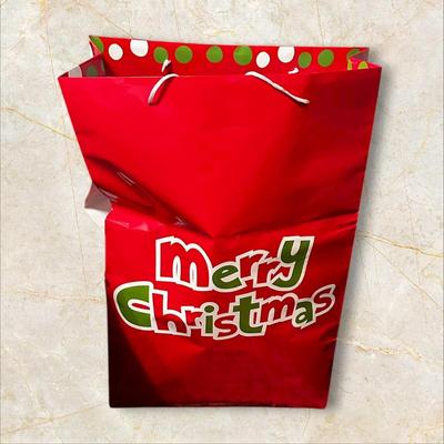 Sale Photo Thumbnail #325: Large Bag of Christmas Wrapping Materials- Gift Bags, Lots of Gift Boxes, a set of bows, tissue, more.