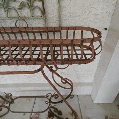 LOT 563O: Metal Plant Stand and Outdoor Wall Decor