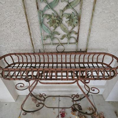 LOT 563O: Metal Plant Stand and Outdoor Wall Decor