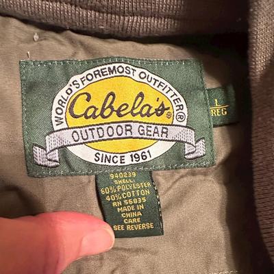Sale Photo Thumbnail #451: Cabela's Fishing Vest with Pockets Galore +Accessories Size Large
Needs to be washed, there is some sticky unknown residue on parts of it.