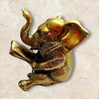 Sale Photo Thumbnail #486: Heavy Brass Elephant Reading Newspaper Decor Approx. 5' tall x 6" wide