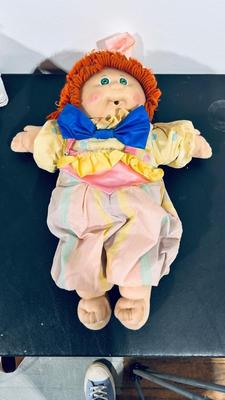 1980’S ORIGINAL CABBAGE PATCH KIDS, a BLONDE A BRUNETTE AND A GINGER HAIRED DOLLS