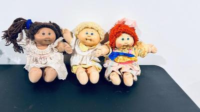1980’S ORIGINAL CABBAGE PATCH KIDS, a BLONDE A BRUNETTE AND A GINGER HAIRED DOLLS