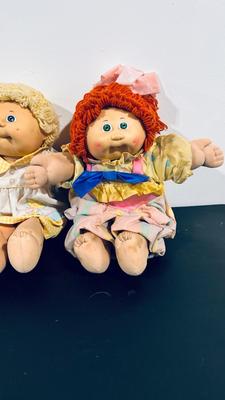 1980’S ORIGINAL CABBAGE PATCH KIDS, a BLONDE A BRUNETTE AND A GINGER HAIRED DOLLS