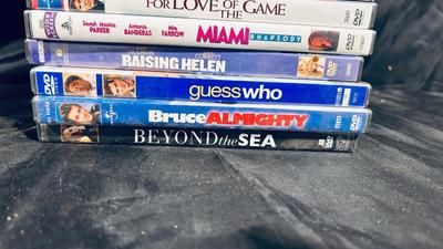 AN ASSORTMENT OF DVDS