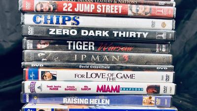 AN ASSORTMENT OF DVDS