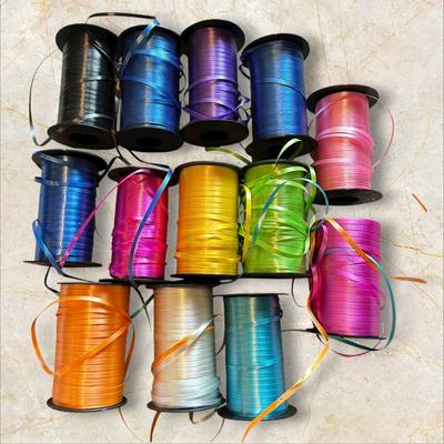 Sale Photo Thumbnail #695: 13 Full Rolls of Colorful Curling Ribbon
