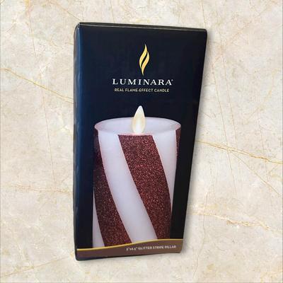 Sale Photo Thumbnail #855: 2 New Luminara Candy Striped Flame Effect Candles
Pillar candle size 3" x 6.5"
Made from real wax.