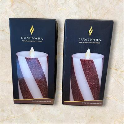 Sale Photo Thumbnail #852: 2 New Luminara Candy Striped Flame Effect Candles
Pillar candle size 3" x 6.5"
Made from real wax.