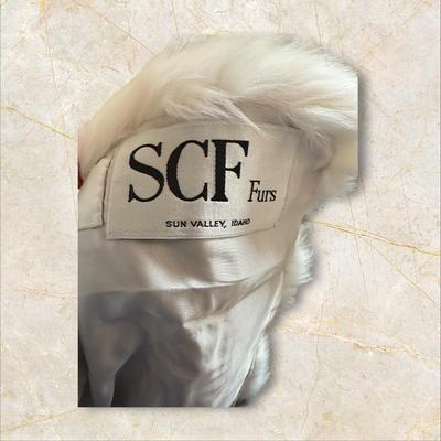 Sale Photo Thumbnail #42: White Jacket Length Mink Coat Bill Blass/SCF Furs
Elizabeth B. Messick Embroidered in Lining
33" Long
Size ?