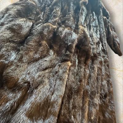 Sale Photo Thumbnail #45: Full Length Brown Mink Coat Size 14 Made in Korea
Elizabeth B Messick embroidered on interior lining.
49" long.