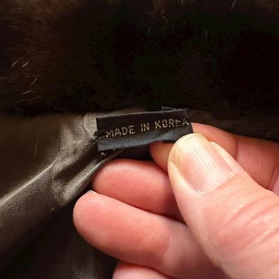 Sale Photo Thumbnail #50: Full Length Brown Mink Coat Size 14 Made in Korea
Elizabeth B Messick embroidered on interior lining.
49" long.