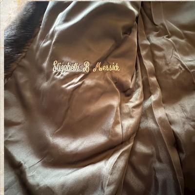 Sale Photo Thumbnail #47: Full Length Brown Mink Coat Size 14 Made in Korea
Elizabeth B Messick embroidered on interior lining.
49" long.