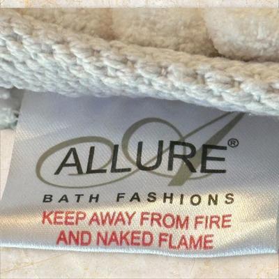 Sale Photo Thumbnail #938: 2 Popcorn Colorful Rug Mats by Allure Bath Fashions
One is torn a bit on the end as shown.