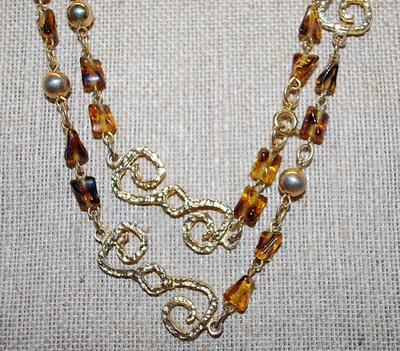 Gold Colored "Figure 8" Swirls WRAP-AROUND NECKLACE with AMBER "Chunk" Stone Accents on a Gold Tone Chain and Circle...