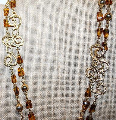 Gold Colored "Figure 8" Swirls WRAP-AROUND NECKLACE with AMBER "Chunk" Stone Accents on a Gold Tone Chain and Circle...