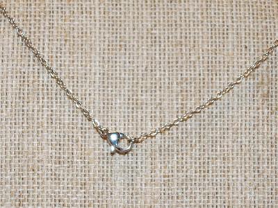 Pretty Heart Shaped Blue Faceted Stone Inside a 10 Clear Stone Silver Heart PENDANT ( ½" x ½") on a Silver Tone Necklace Chain...