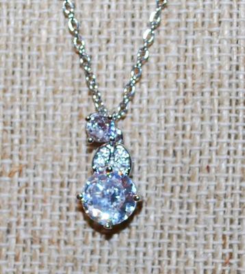 Round Clear Stone with Spaces and Small Stone PENDANT (¾" x ¼") on a Silver Tone Necklace Chain 17" L