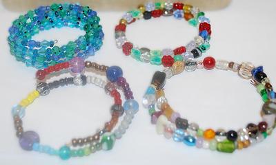 Collection of 4 WRAP-AROUND BRACELETS (2¾"+ Opening) with Assortment of Colors and Shaped Beads