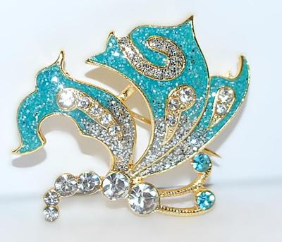 AQUAMARINE "Jumping Dolphins" BROOCH (1½" x 1½") with Body & "Waves" Jeweled Accent Stones on a Gold...