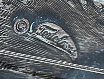 Looped Edge Silver Colored BROOCH (2¼" x 1¼") Marked "© Tortolam" - on a Silver Tone Setting