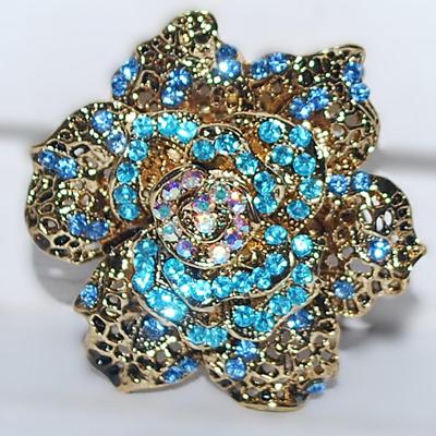 Beautiful ROSE STYLE BROOCH (2" Diam.) with Iridescent and Aquamarine Stone Center & Gold Colored Petals and SNAP CLOSURE on a...